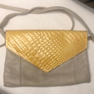 TANO Yellow and beige colored leather vintage handbag. Made in Italy.